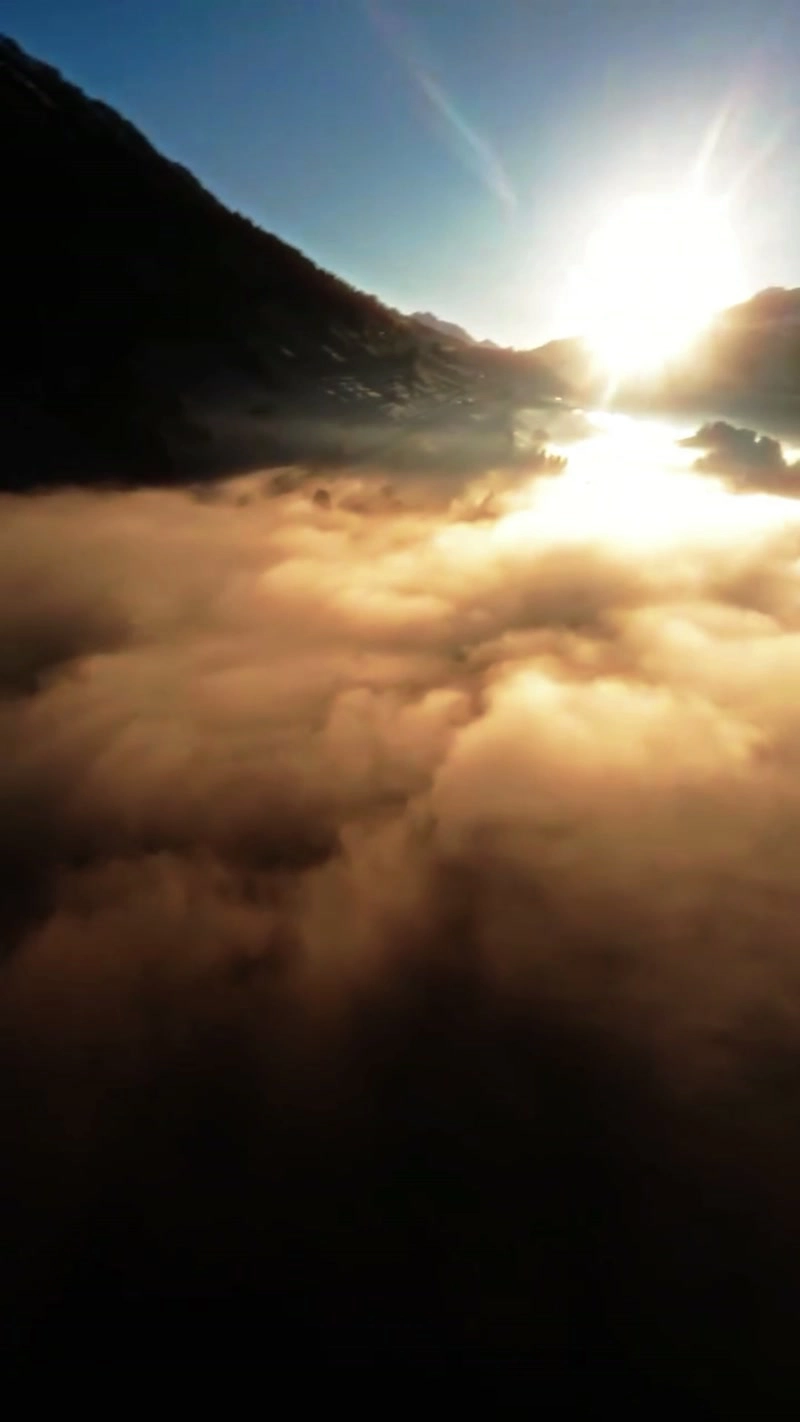 Shuttling through the sea of clouds, touching the sky